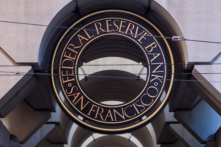 The sign outside the San Francisco Federal Reserve Bank with a black background and gold letters