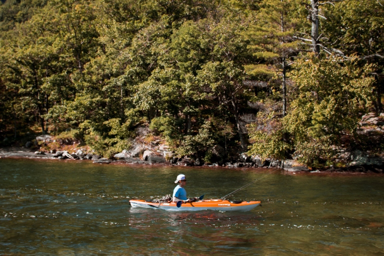 A man kayaking in a river